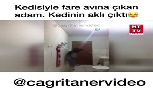 Kedisiyle Fare Avına Çıkan Adam