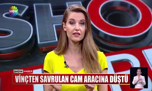 Vinçten savrulan cam aracına düştü