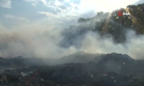 Antalya’daki moloz yangınında gökyüzü bulutla kaplandı, güneş kızıla döndü 